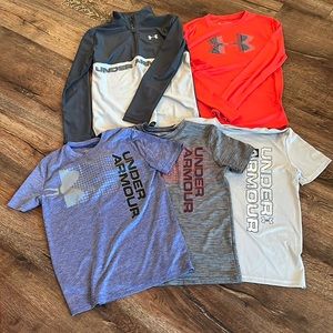 Five (5) Under Armour shirts in youth XL